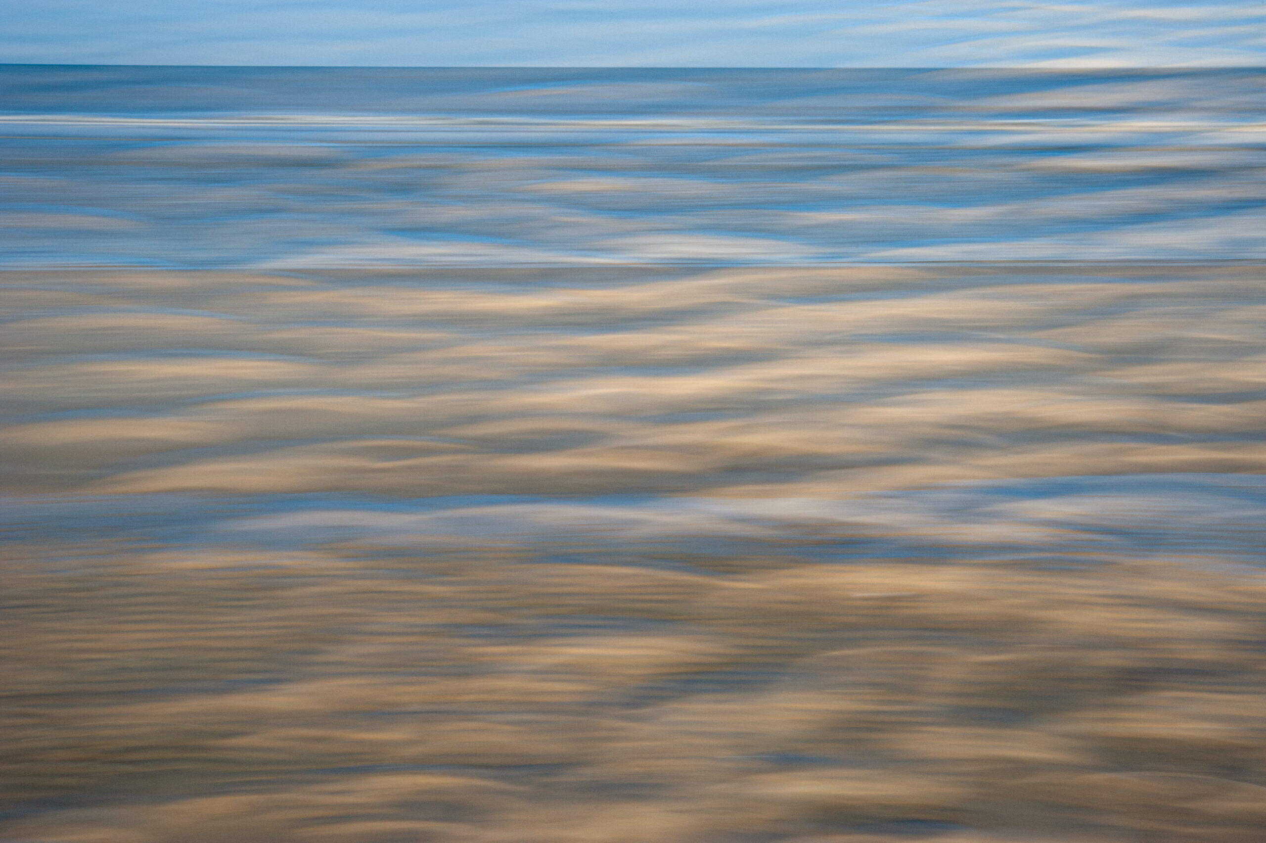 Bewegende foto zee en strand - foto van Lisette Geel